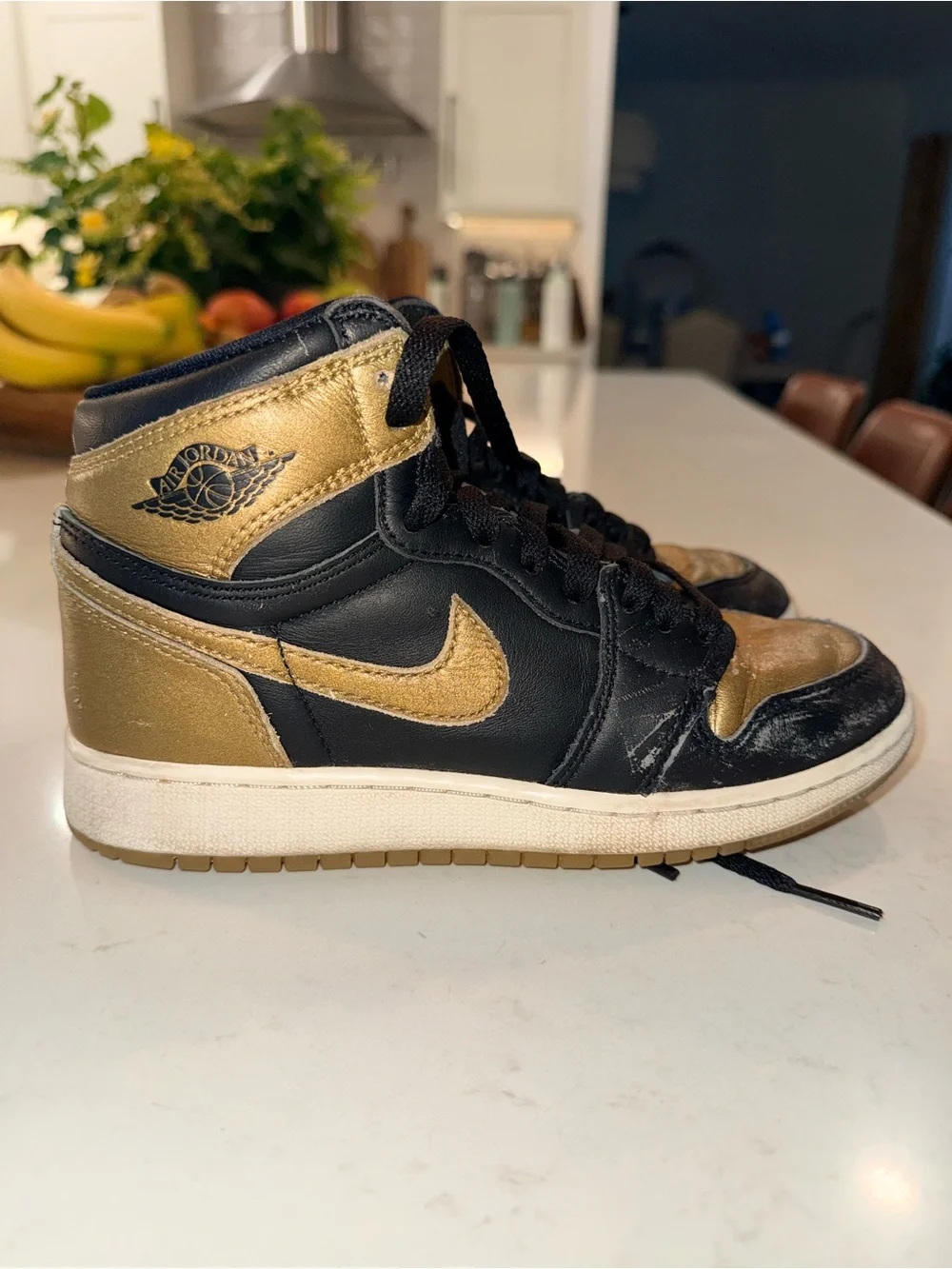Jordan Kids Black and Gold High-Top Sneakers with White Soles